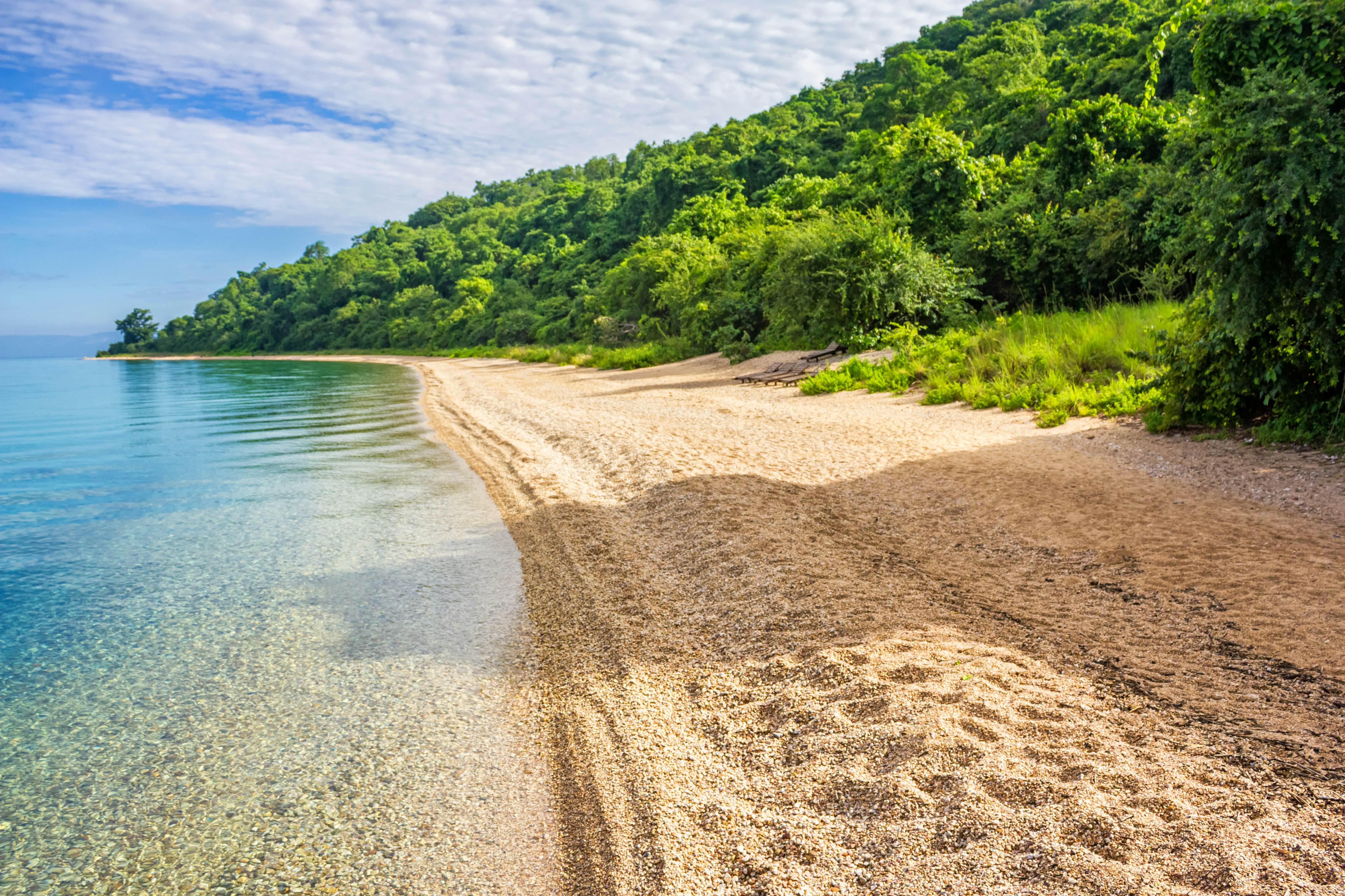 Stock photograph of a beautiful beach and Lake Tanganyika in Gombe Stream National Park, Tanzania, Africa